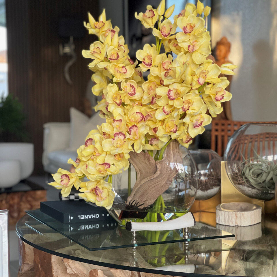 Yellow Cymbidiums in Moon Vase