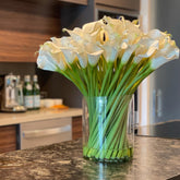 Cala Lilies in a 25 cm Glass Cylinder