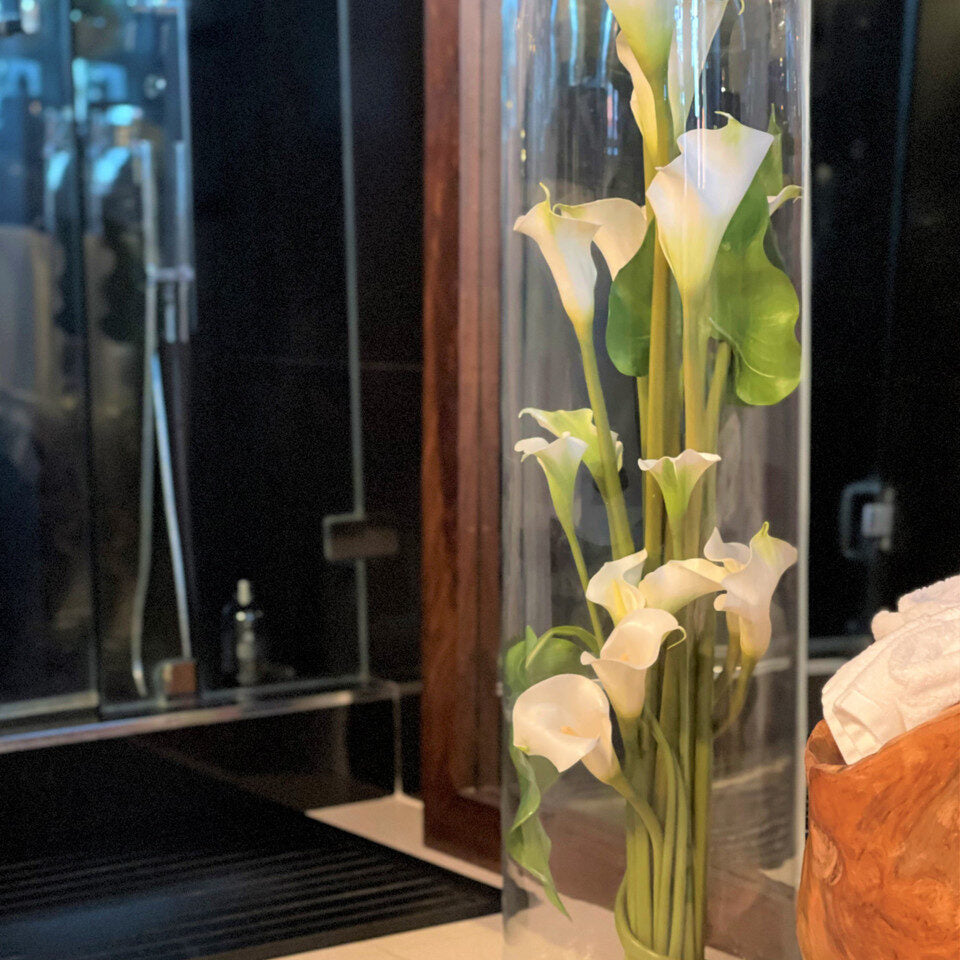 White Calla Lilies and Leaves in Rota Cylinder