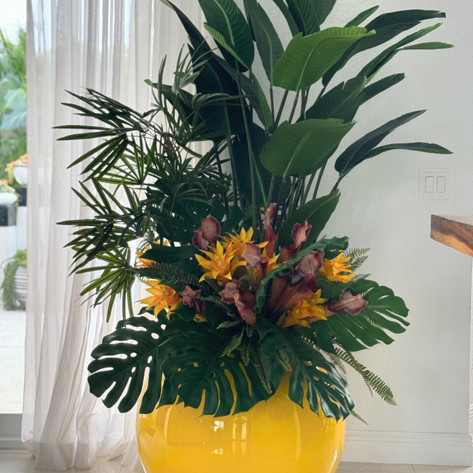 Tropical Mix Plants in Yellow Globe Planter