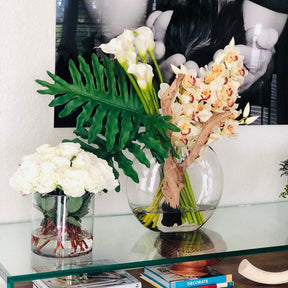 Cymbidiums and Callas in the Moon Vase